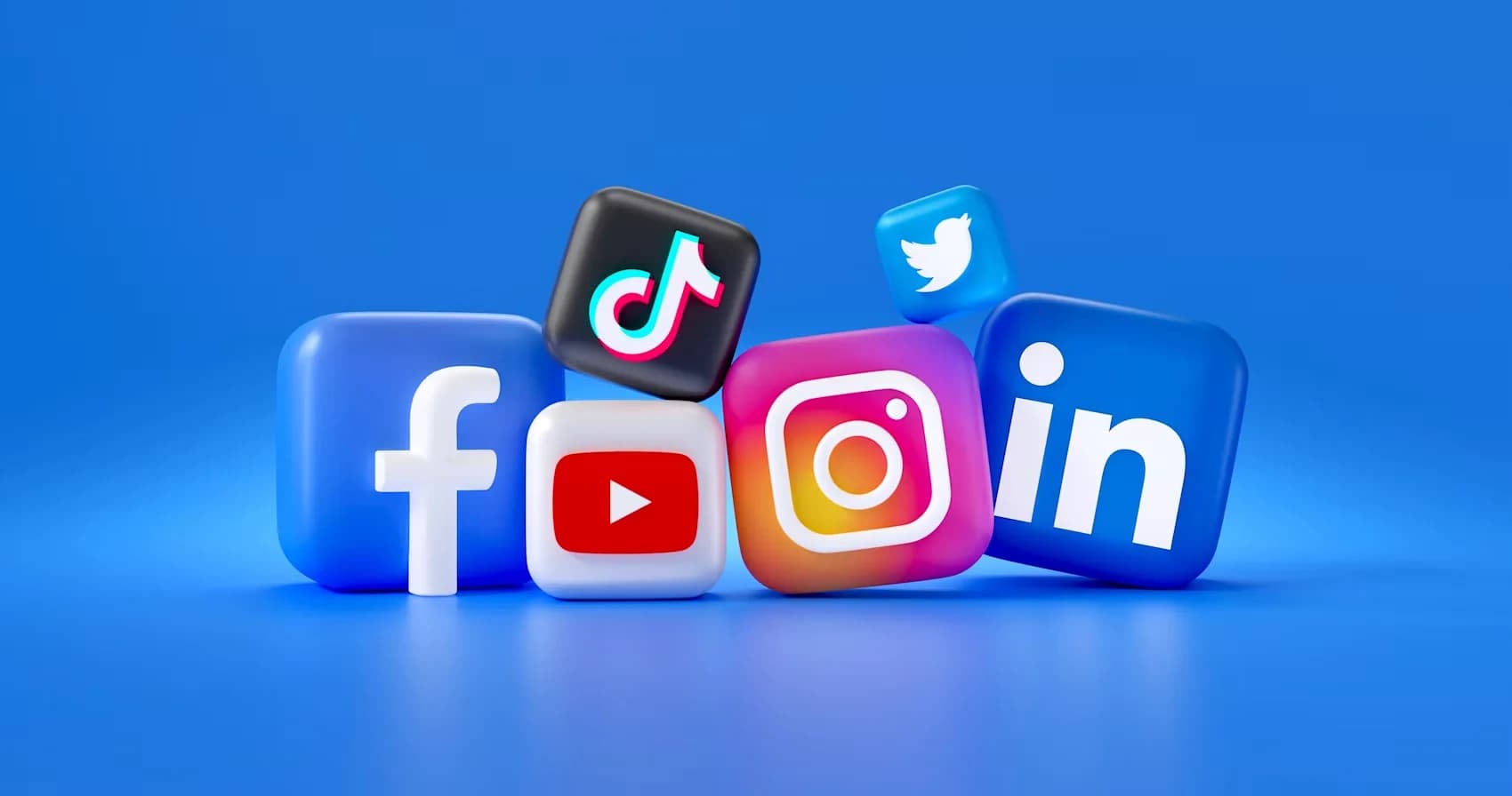 Facebook, YouTube, Instagram, LinkedIn, TikTok and Twitter icons on a blue background